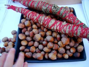 smudge sticks and hazelnuts at our booth